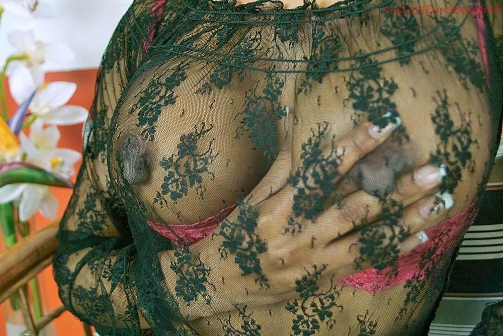 16P Woman playing with her huge erect nipples