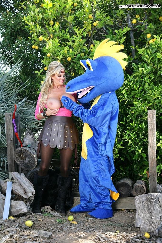 16P Busty blonde Kelly Madison has fun with a monster