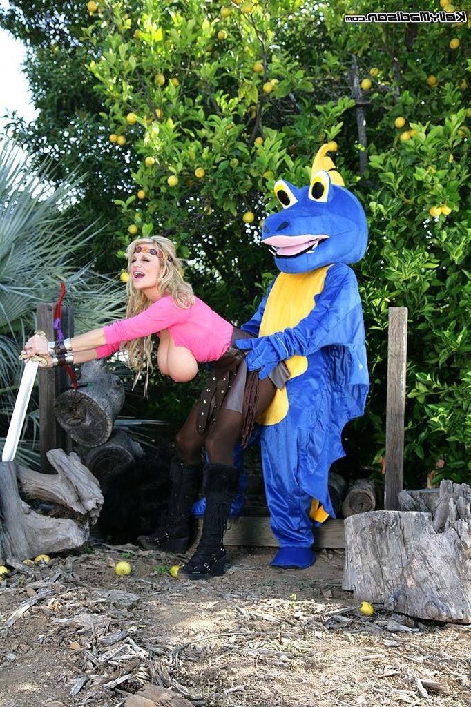 16P Busty blonde Kelly Madison has fun with a monster