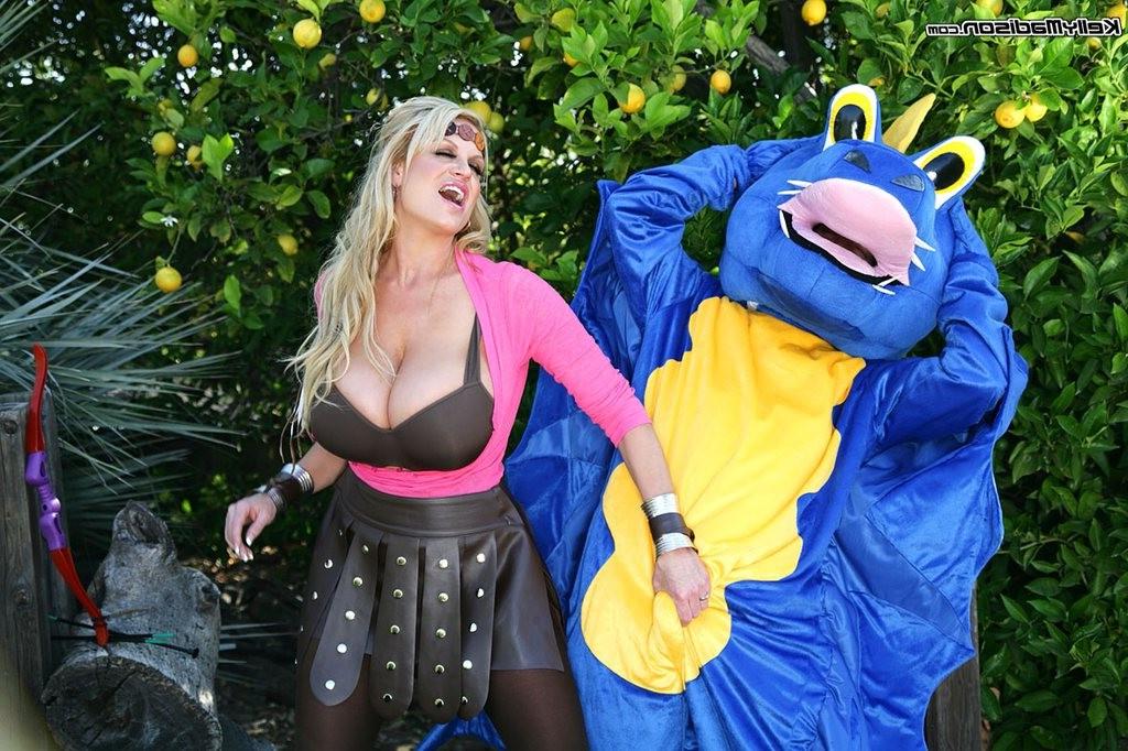 16P Busty blonde Kelly Madison has fun with a monster