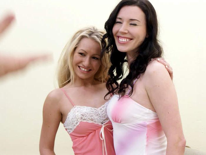 15P Two sexy lesbians doing each other with strapon