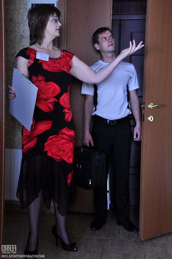 20P Kinky milf in crotchless hose shows a guy her flat before going 