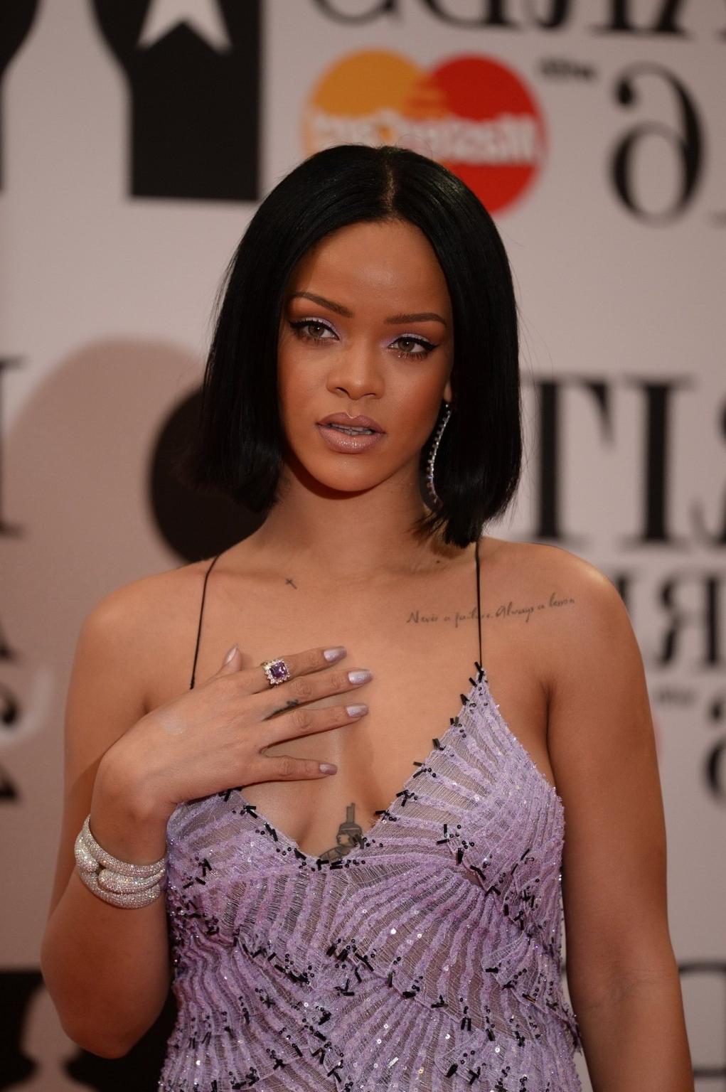 16P Rihanna braless in slightly see through maxi dress