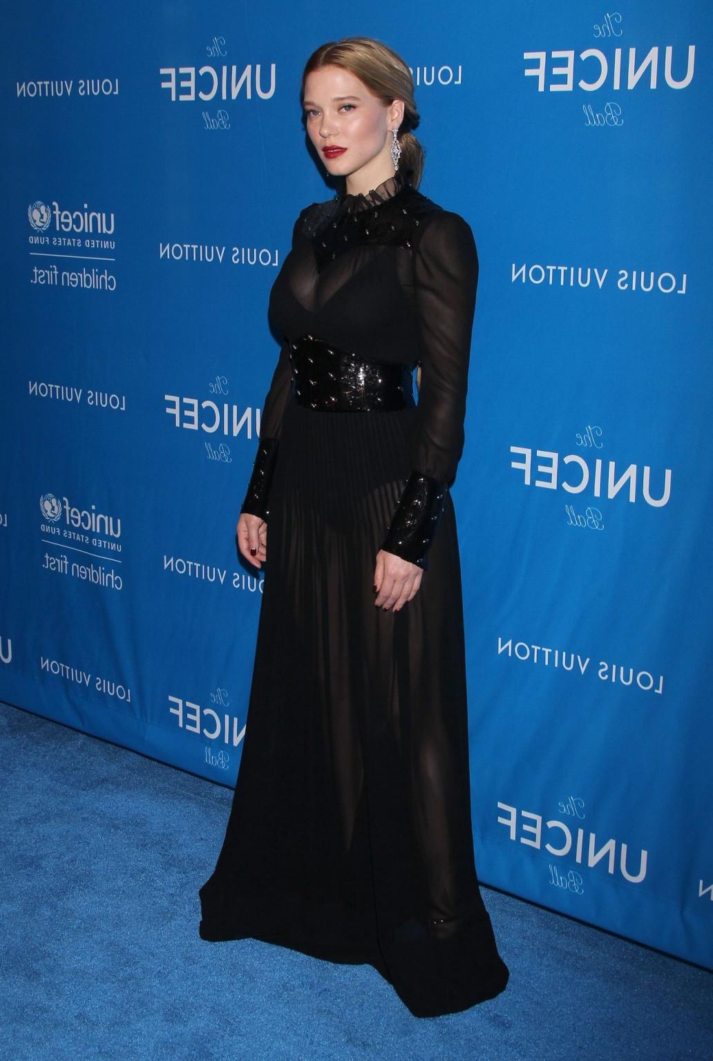 16P Lea Seydoux busty and leggy in black see through dress