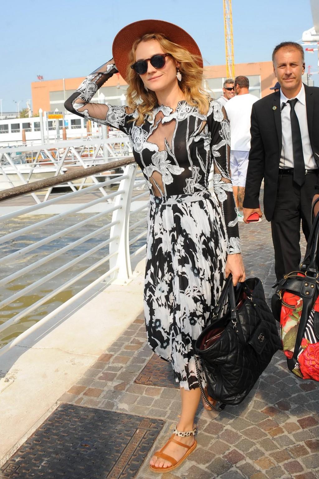 15P Diane Kruger shows off her big boobs in see through dress