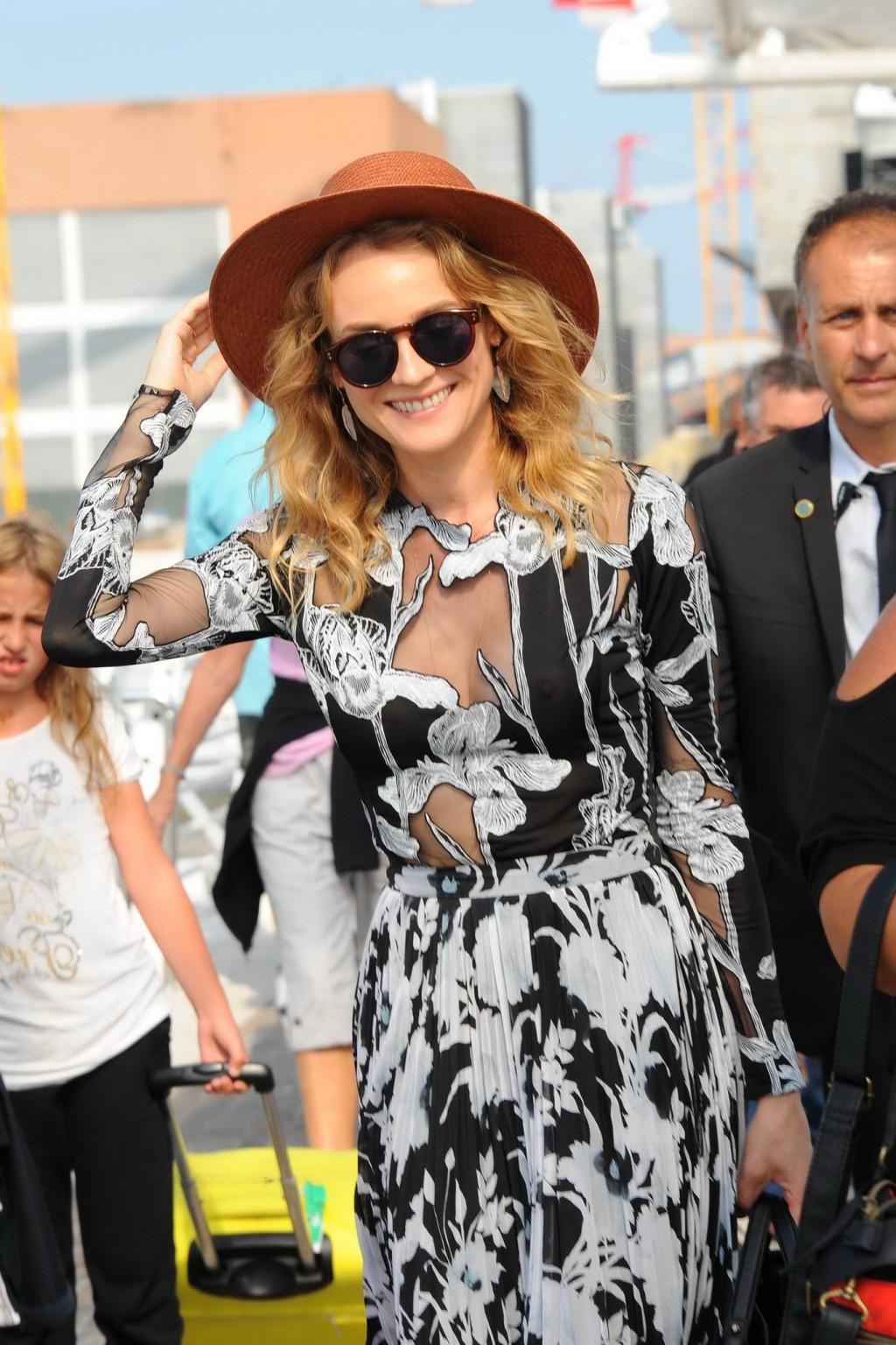 15P Diane Kruger shows off her big boobs in see through dress
