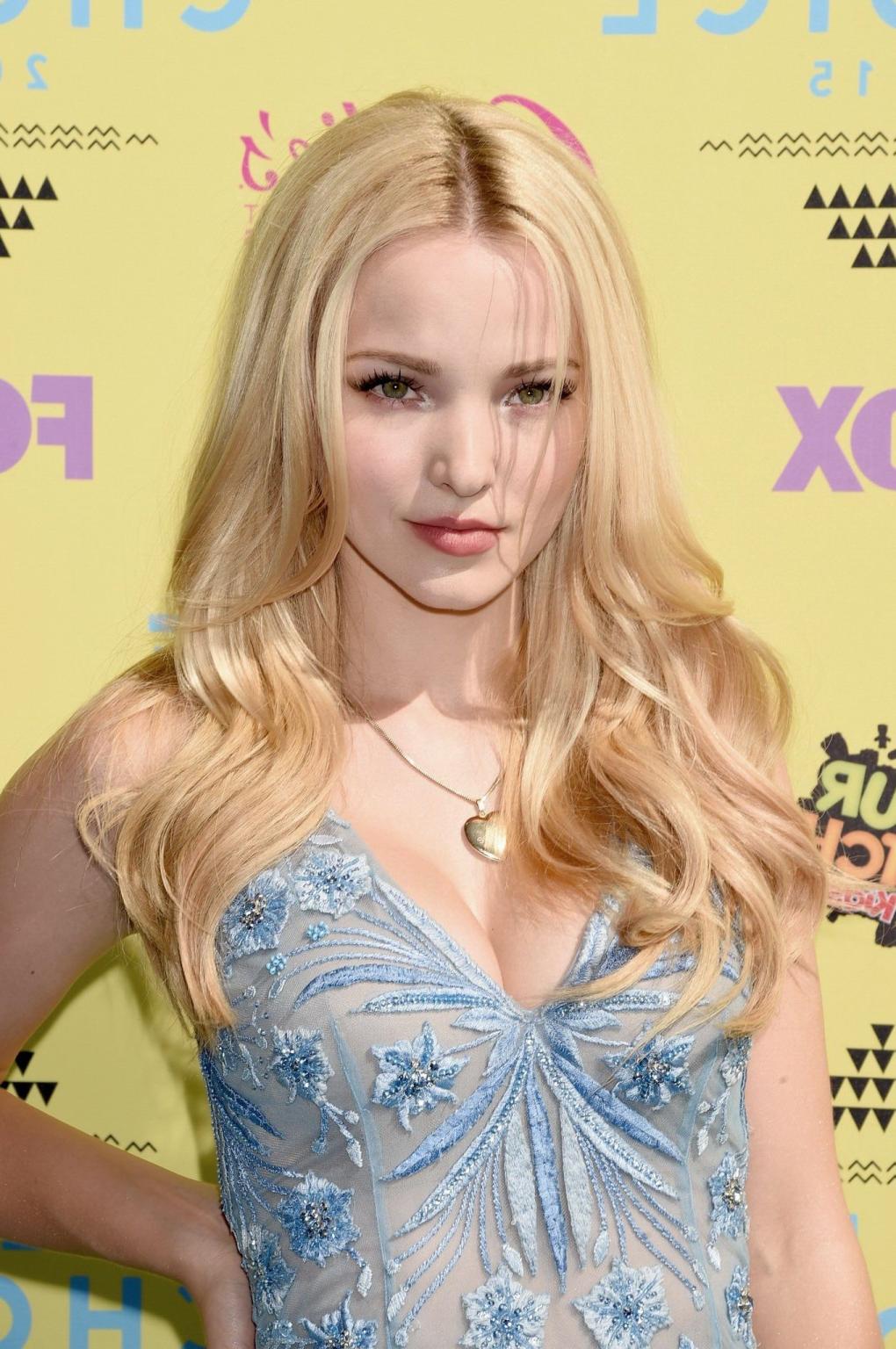 16P Dove Cameron busty and leggy in see through mini dress