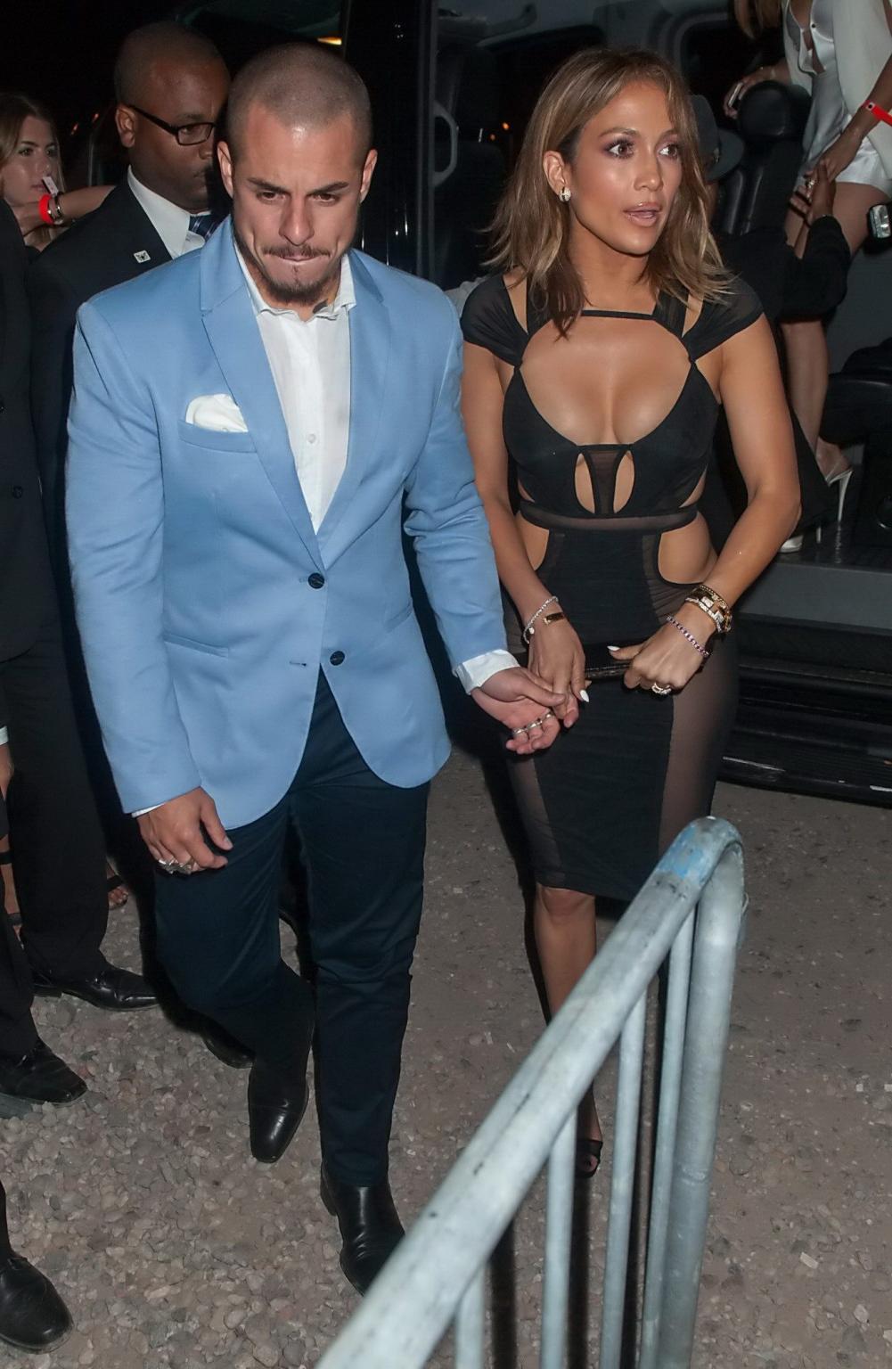 16P Jennifer Lopez braless and pantyless in a see through dress