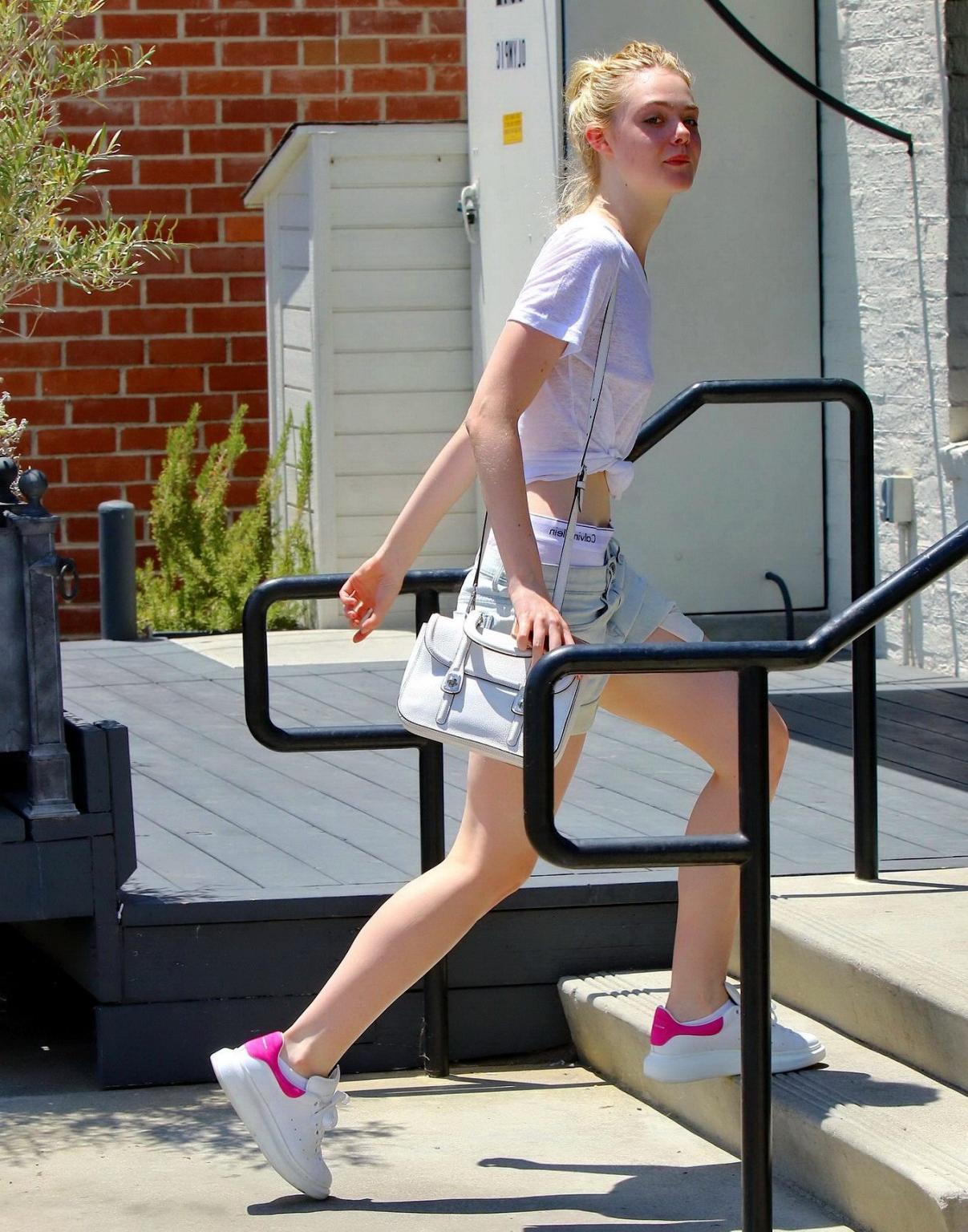 16P Elle Fanning braless wearing a see through Tshirt