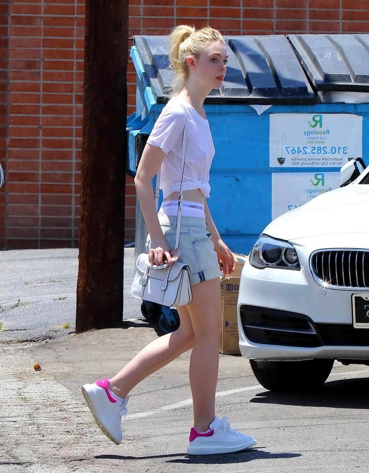16P Elle Fanning braless wearing a see through Tshirt