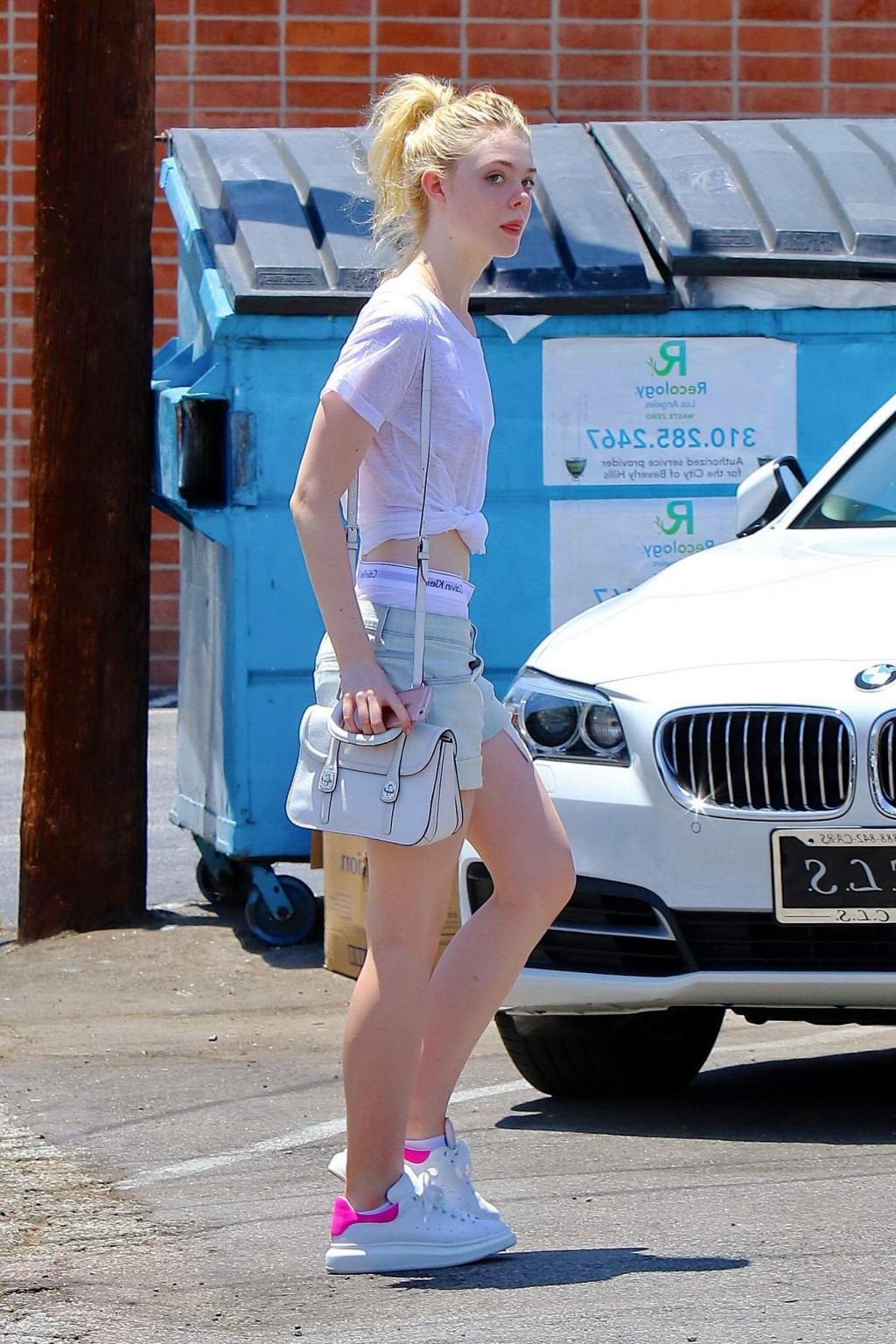 16P Elle Fanning braless wearing a see through Tshirt