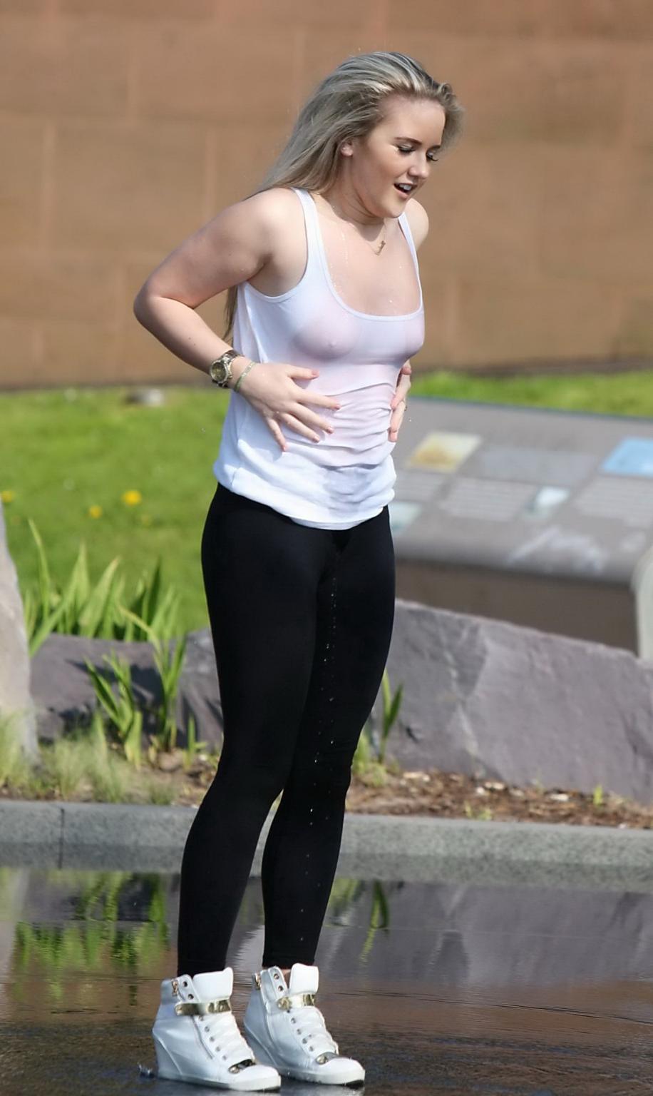 16P Rachel Rhodes shows off her boobs braless in wet see through top out in Liverpoo