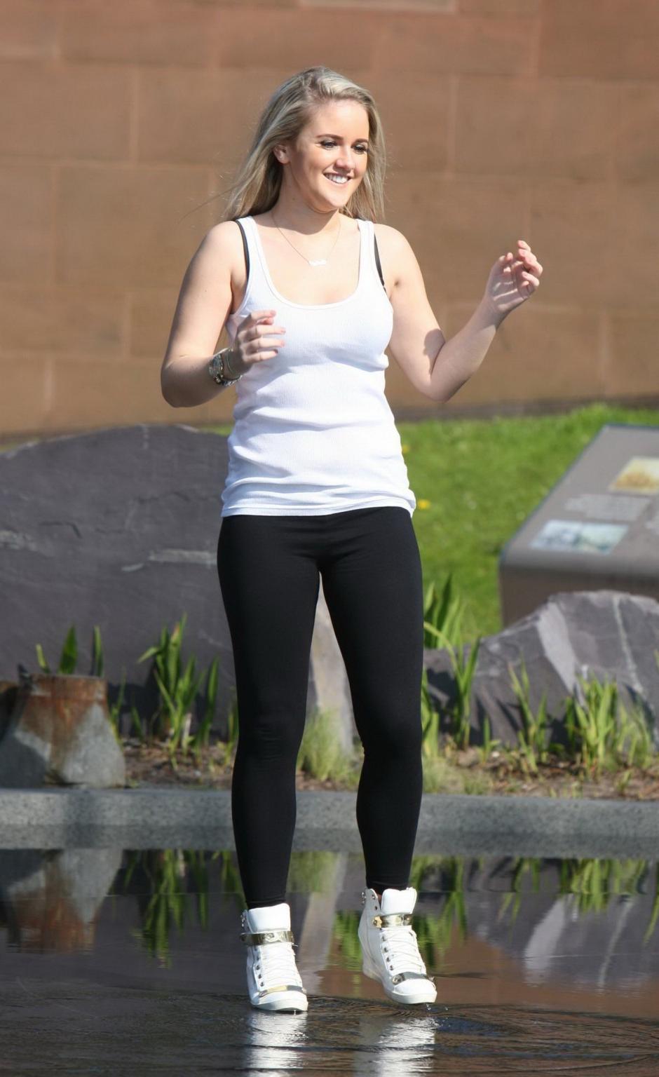 16P Rachel Rhodes shows off her boobs braless in wet see through top out in Liverpoo