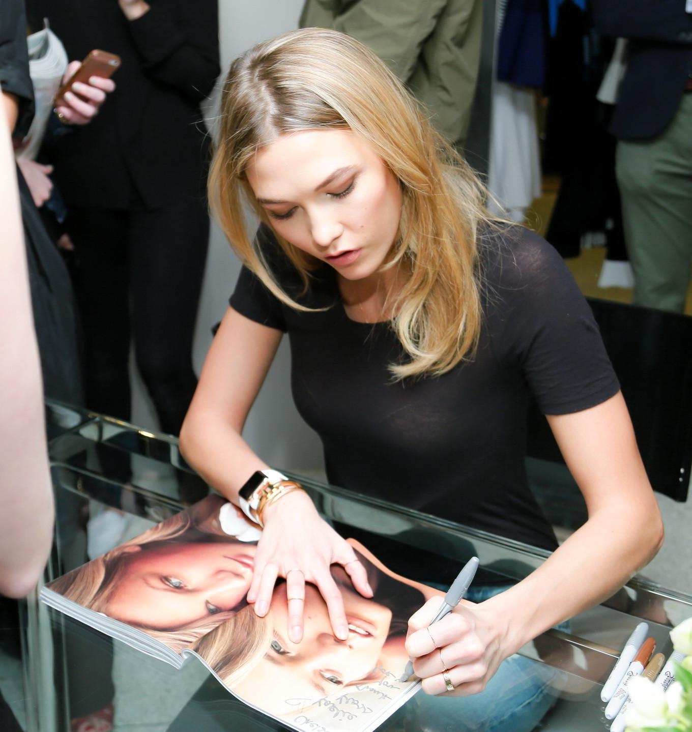 16P Karlie Kloss see through to bra at the Frame Denim launch in NYC