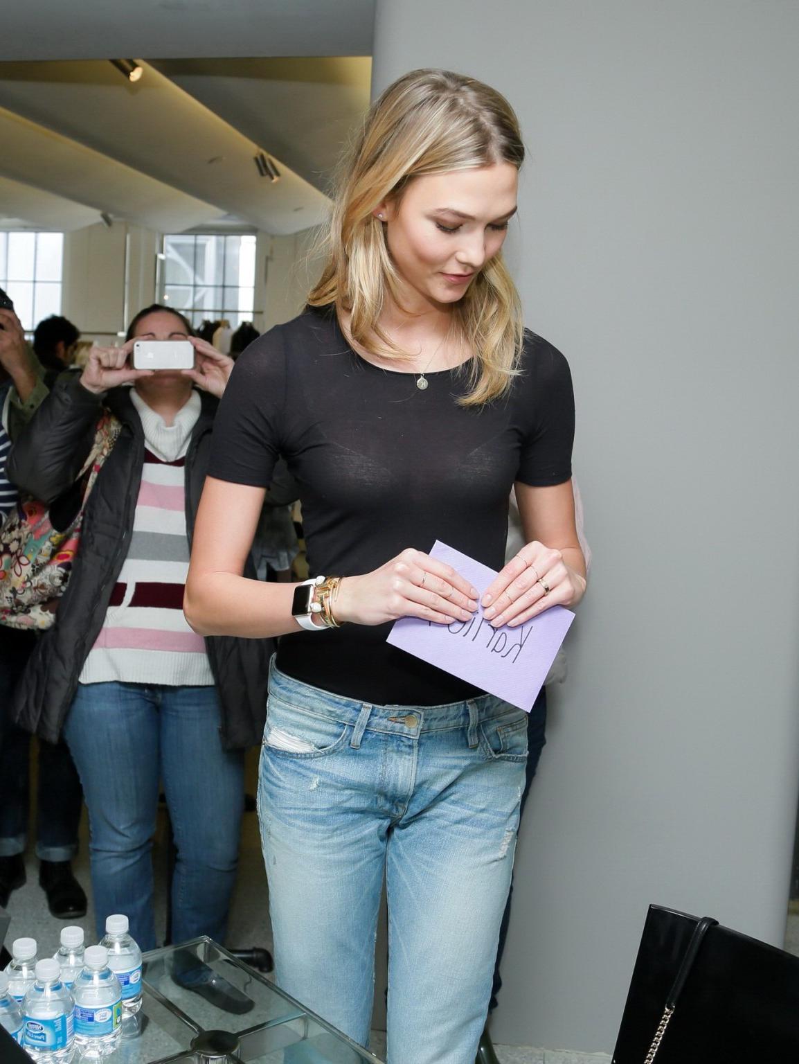 16P Karlie Kloss see through to bra at the Frame Denim launch in NYC