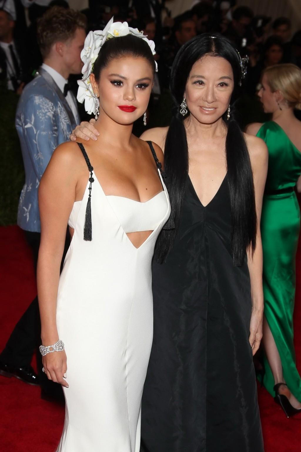 16P Selena Gomez busty and booty in a low cut white backless dress at China Through 