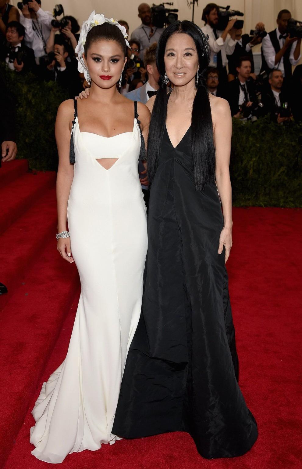 16P Selena Gomez busty and booty in a low cut white backless dress at China Through 