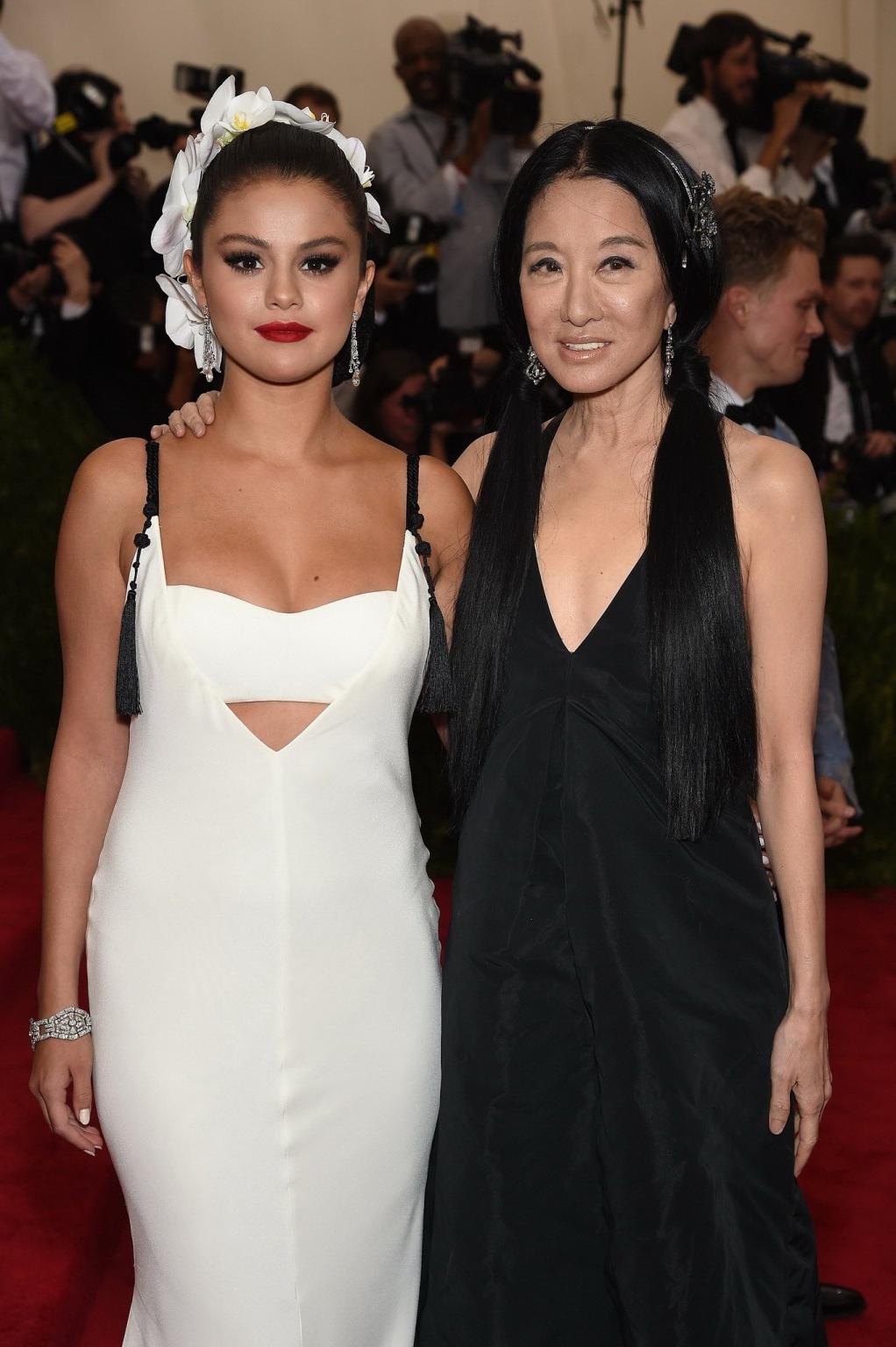 16P Selena Gomez busty and booty in a low cut white backless dress at China Through 