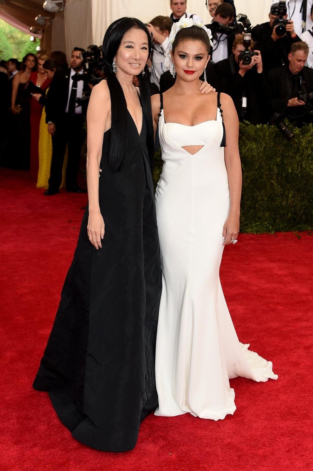 16P Selena Gomez busty and booty in a low cut white backless dress at China Through 