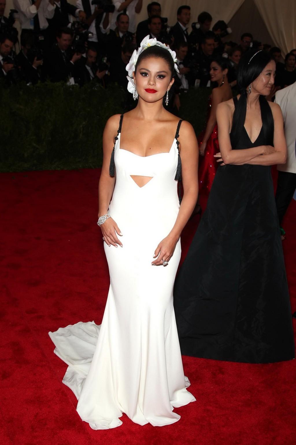 16P Selena Gomez busty and booty in a low cut white backless dress at China Through 