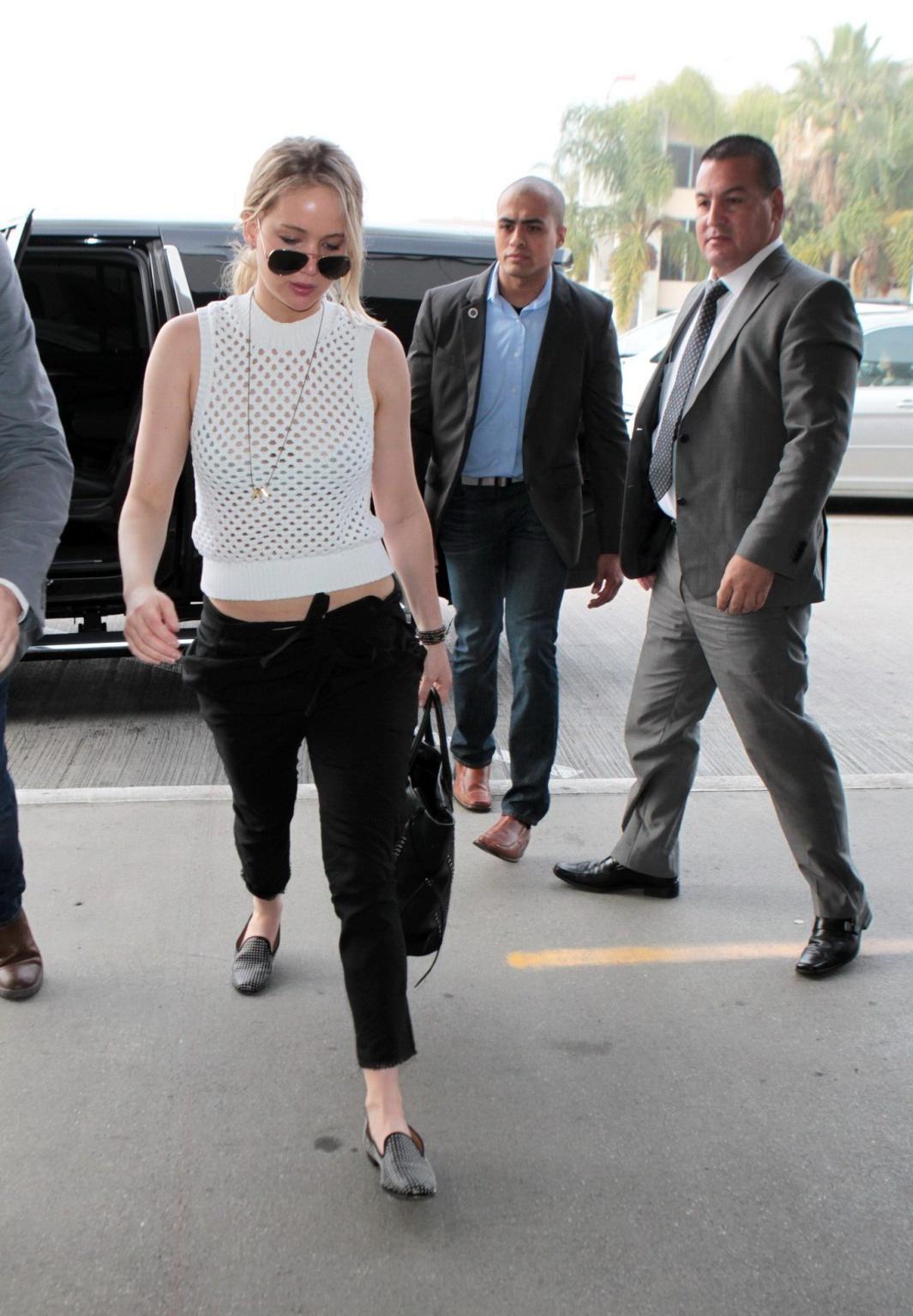 16P Busty Jennifer Lawrence see through to bra out in NYC
