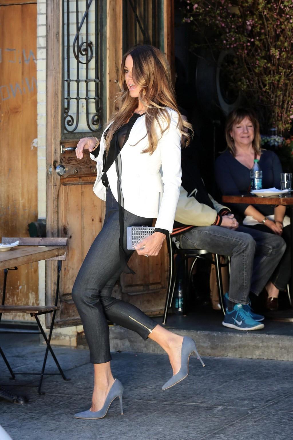 16P Kelly Bensimon shows off her big boobs wearing a see through shirt at the photos