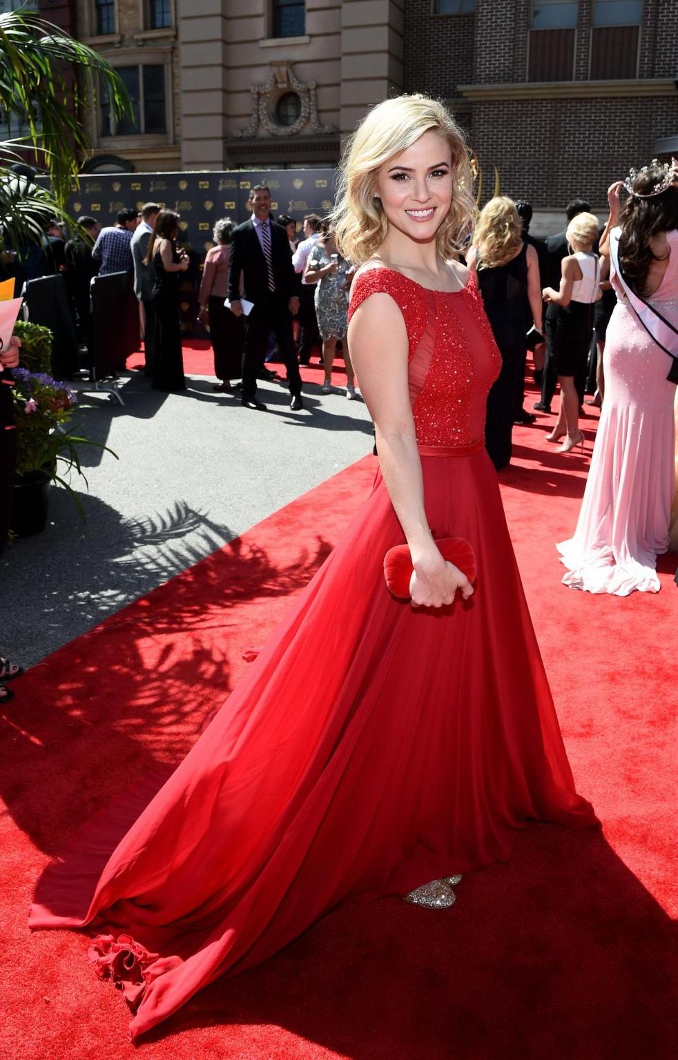 16P Linsey Godfrey busty and braless wearing a partially see through red dress at th