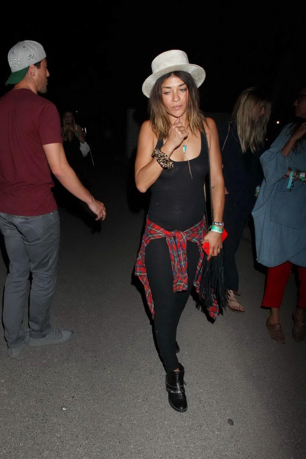 16P Jessica Szohr showing boobs braless in black see through dress at Coachella Musi