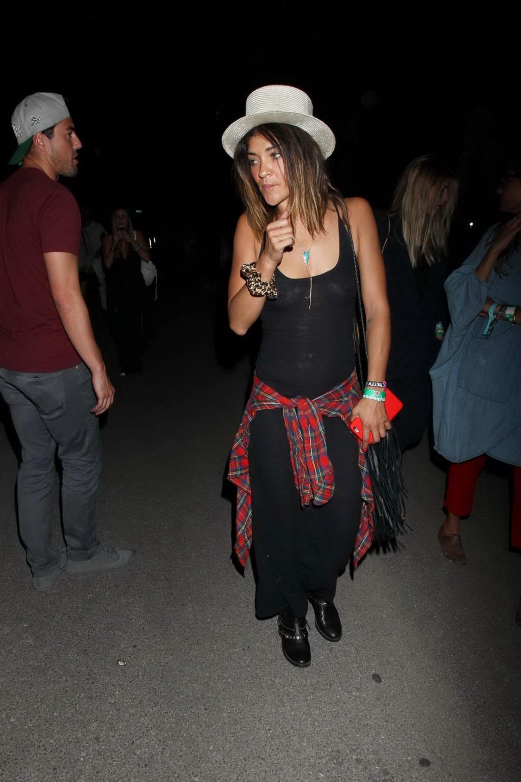16P Jessica Szohr showing boobs braless in black see through dress at Coachella Musi
