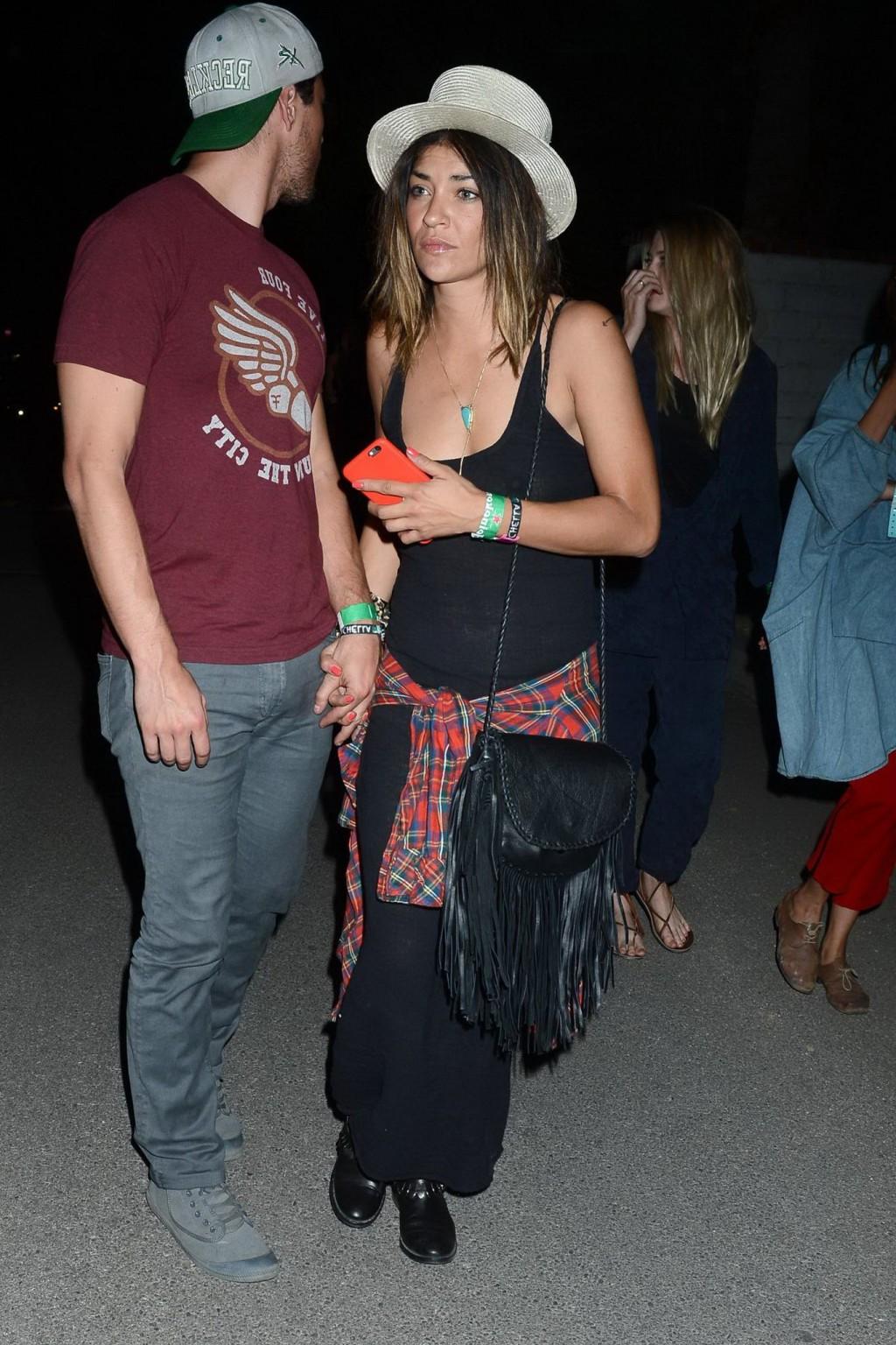 16P Jessica Szohr showing boobs braless in black see through dress at Coachella Musi