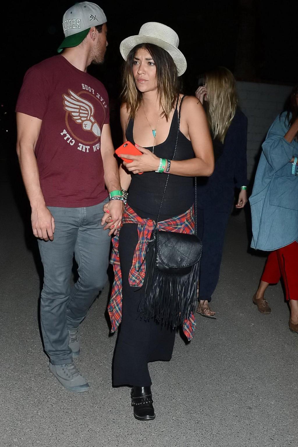 16P Jessica Szohr showing boobs braless in black see through dress at Coachella Musi