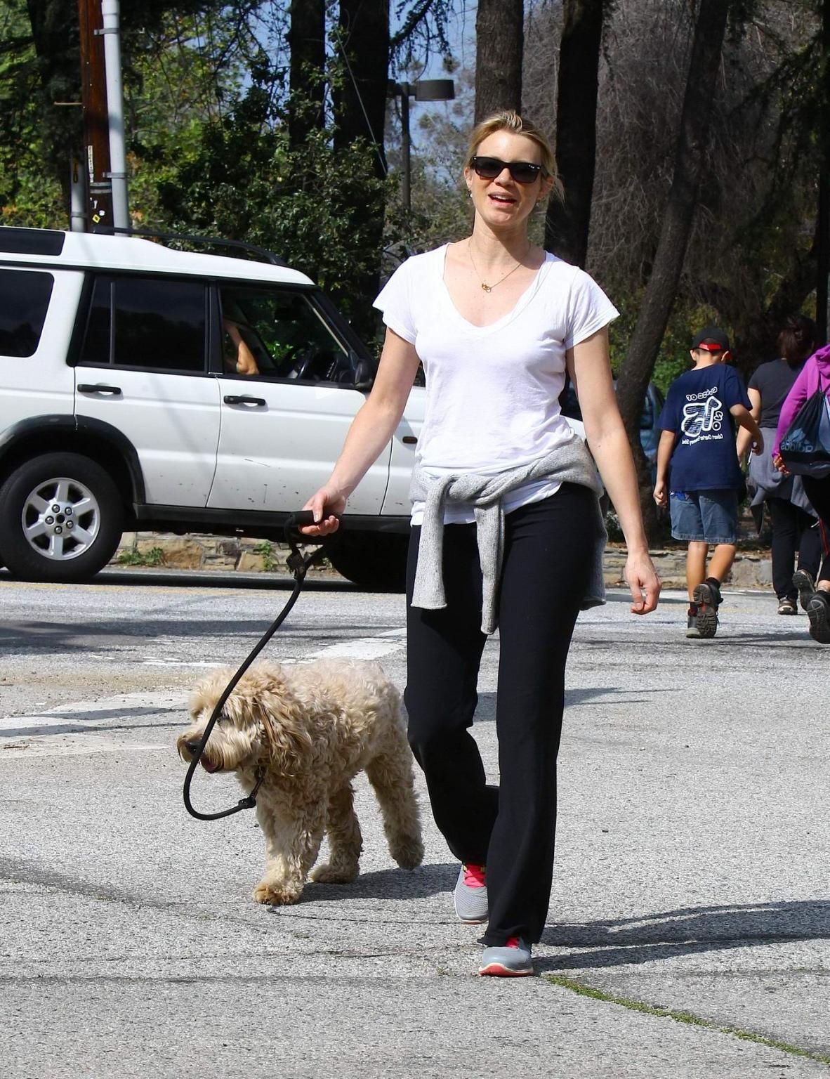 16P Amy Smart downblouse while walking her dog at a park in Beverly Hills
