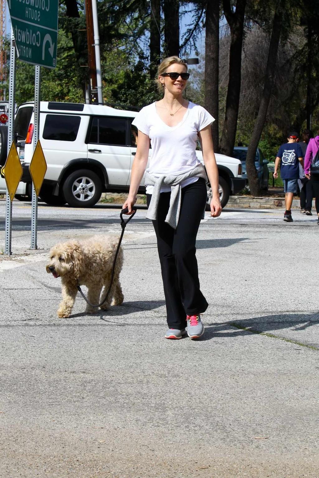 16P Amy Smart downblouse while walking her dog at a park in Beverly Hills