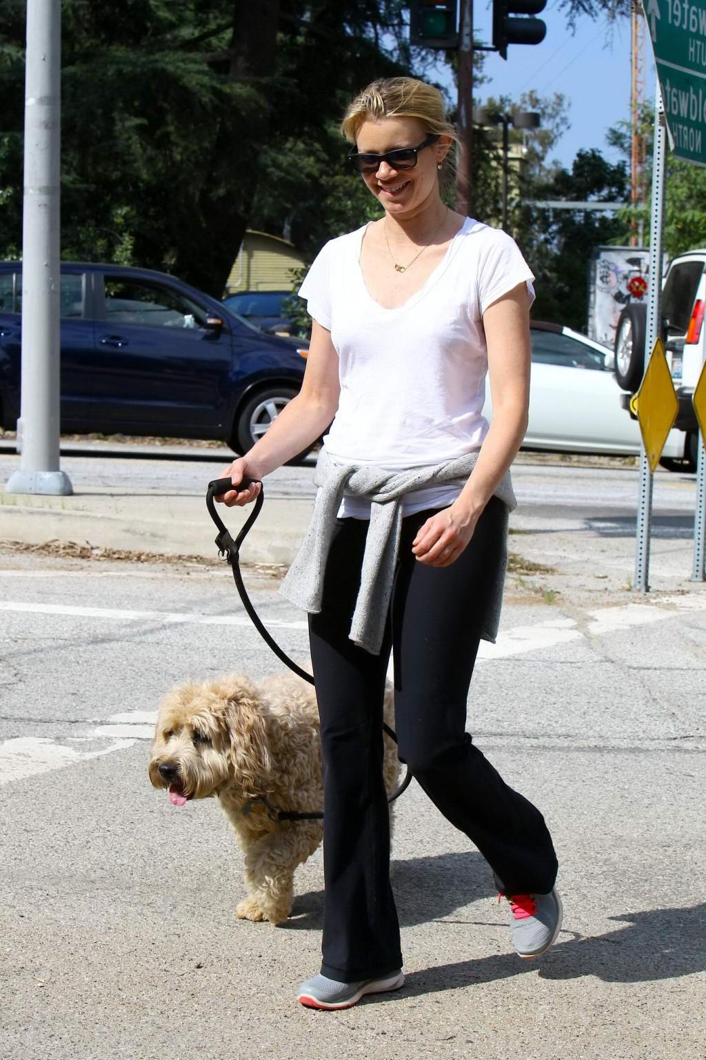 16P Amy Smart downblouse while walking her dog at a park in Beverly Hills