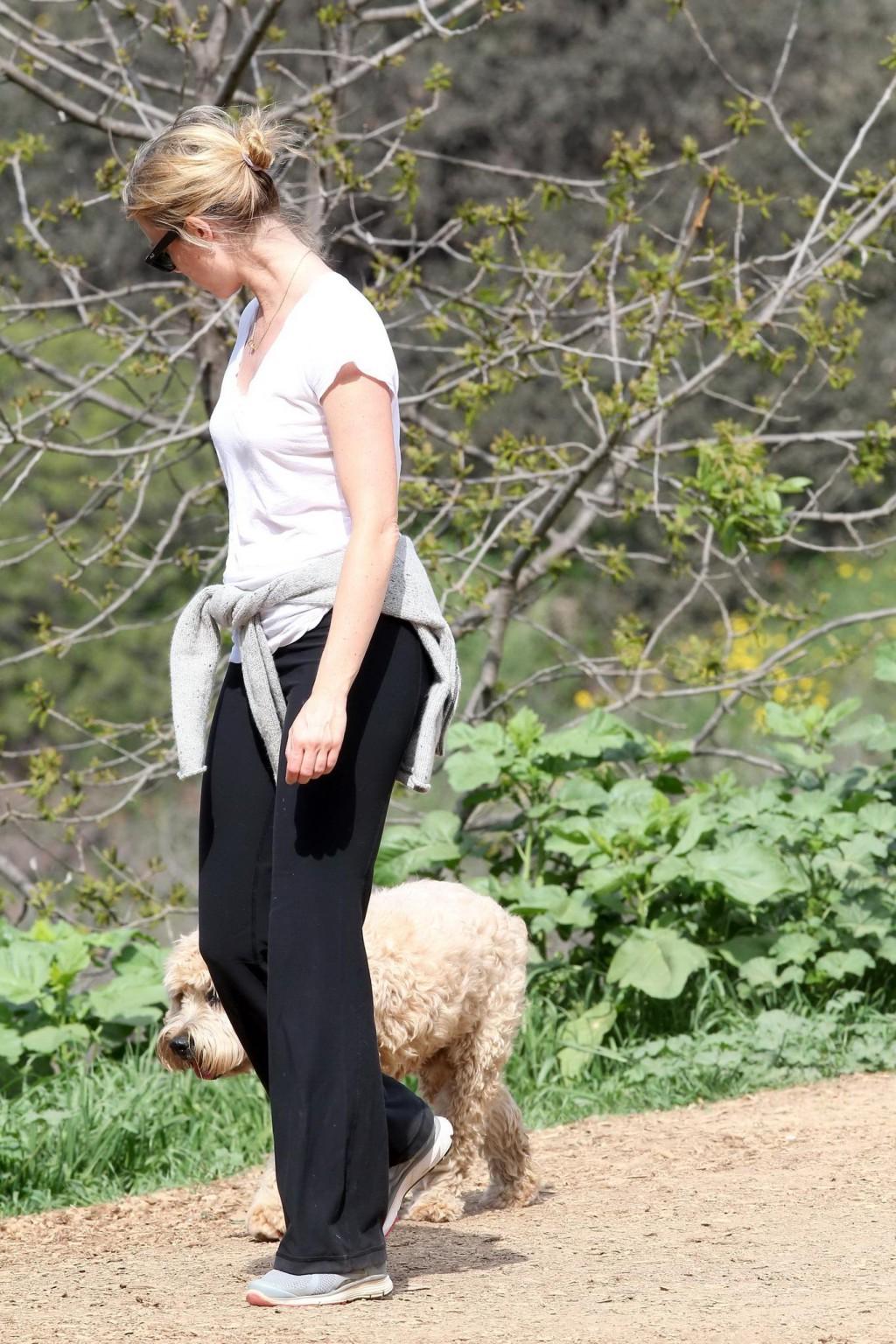 16P Amy Smart downblouse while walking her dog at a park in Beverly Hills