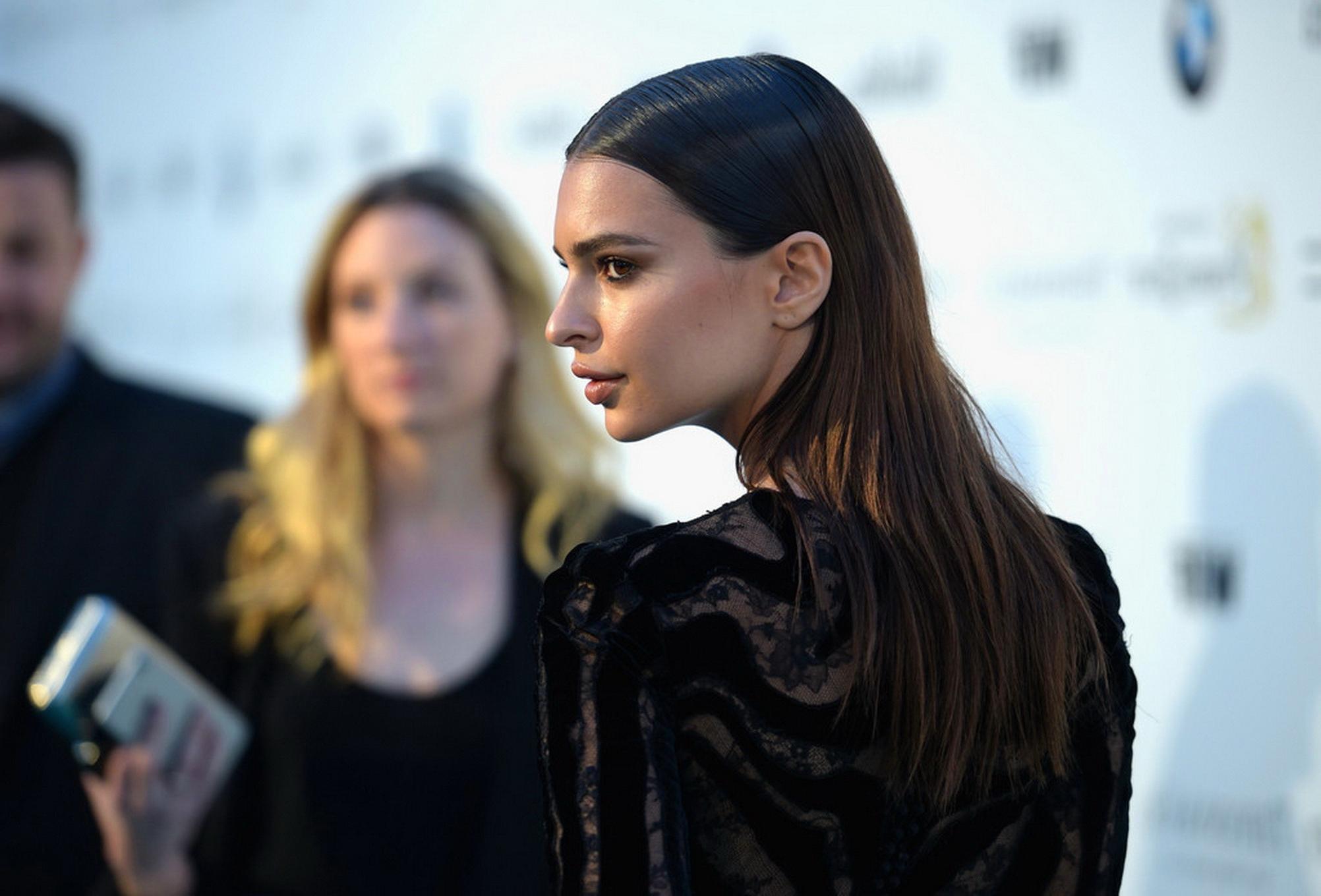 16P Emily Ratajkowski braless wearing black see through dress at 2015 Tom Ford Colle
