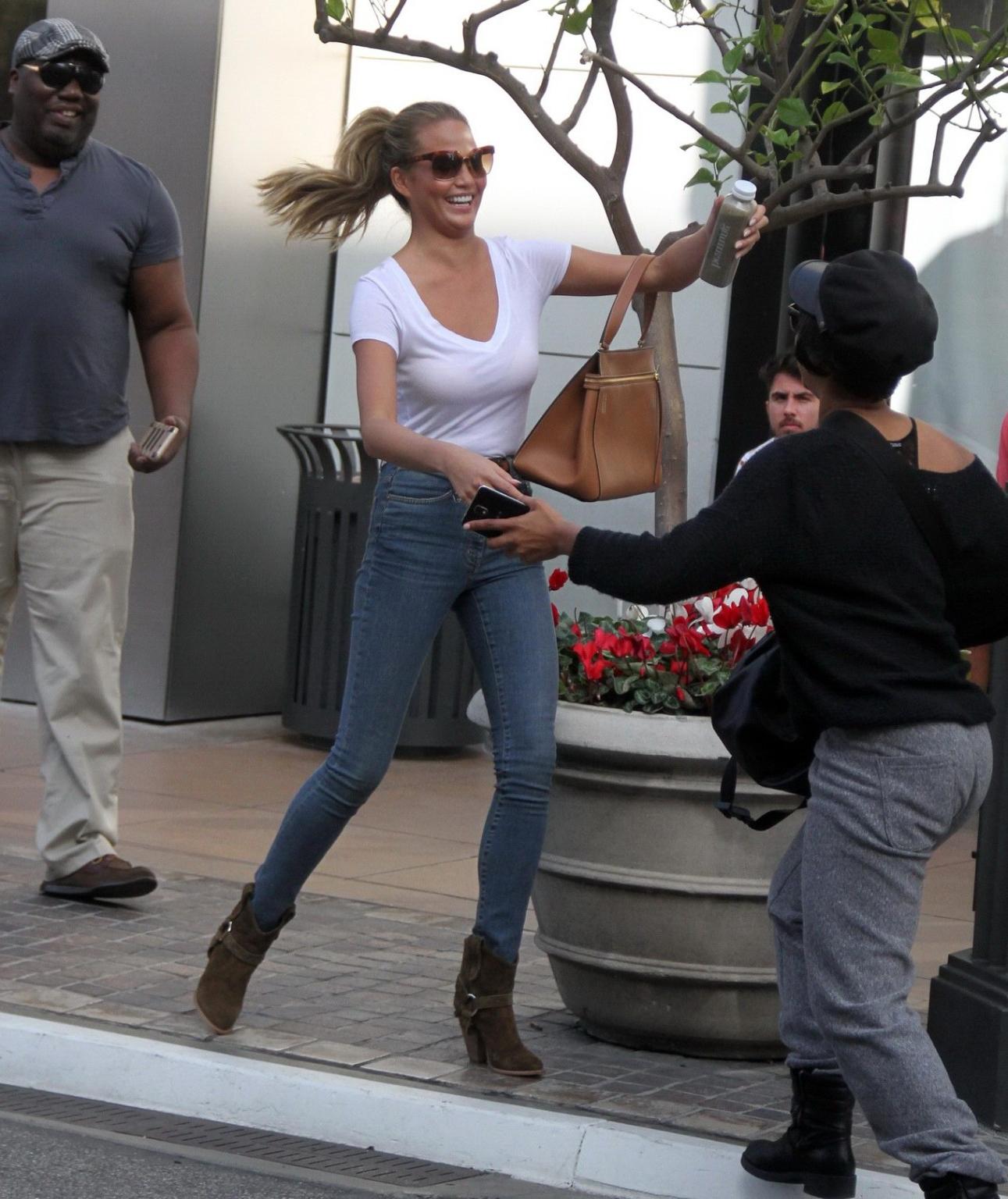 16P Chrissy Teigen see through to bra out in West Hollywood