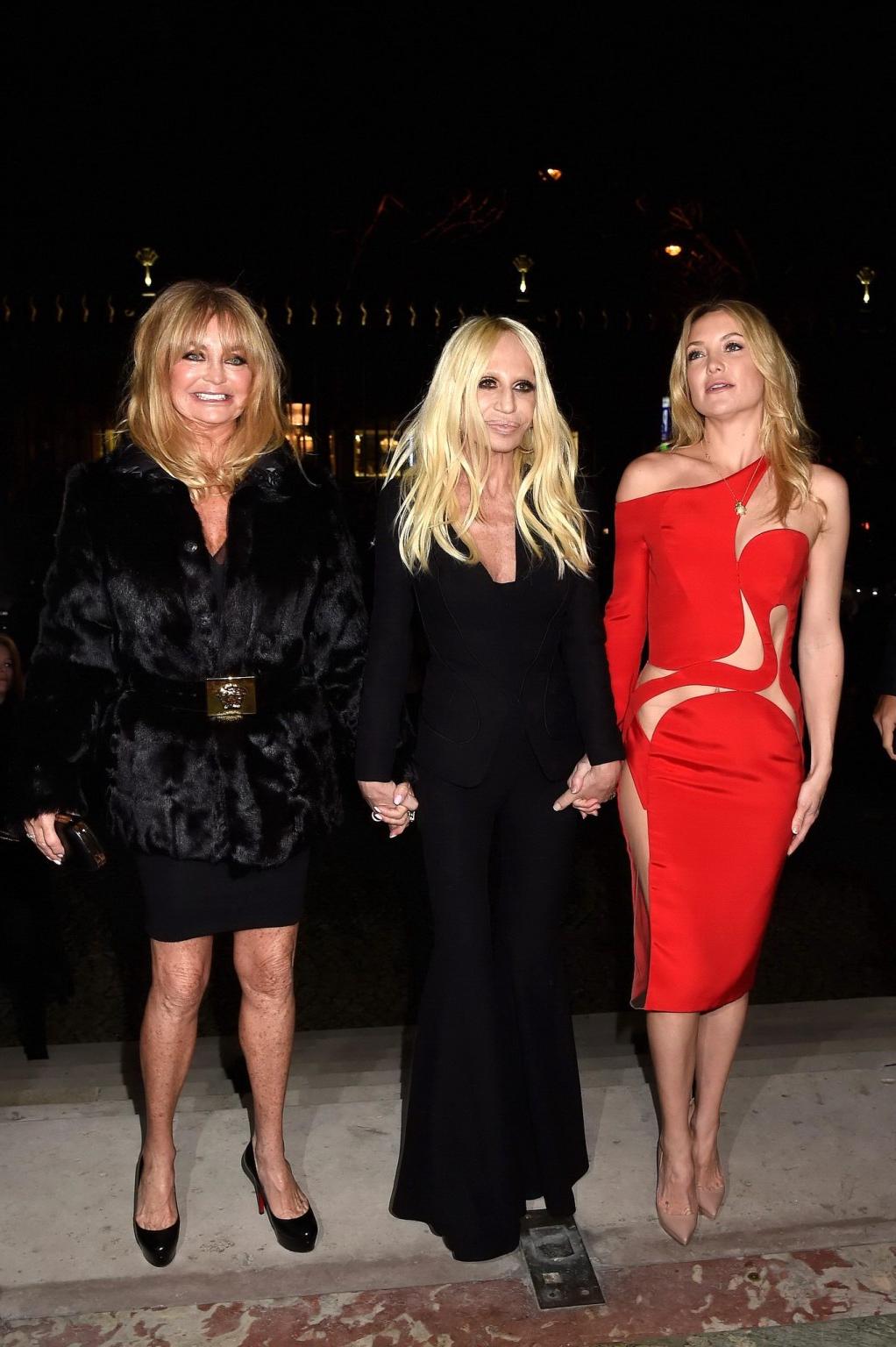 16P Kate Hudson pantyless wearing a partially see through red dress at the Versace F
