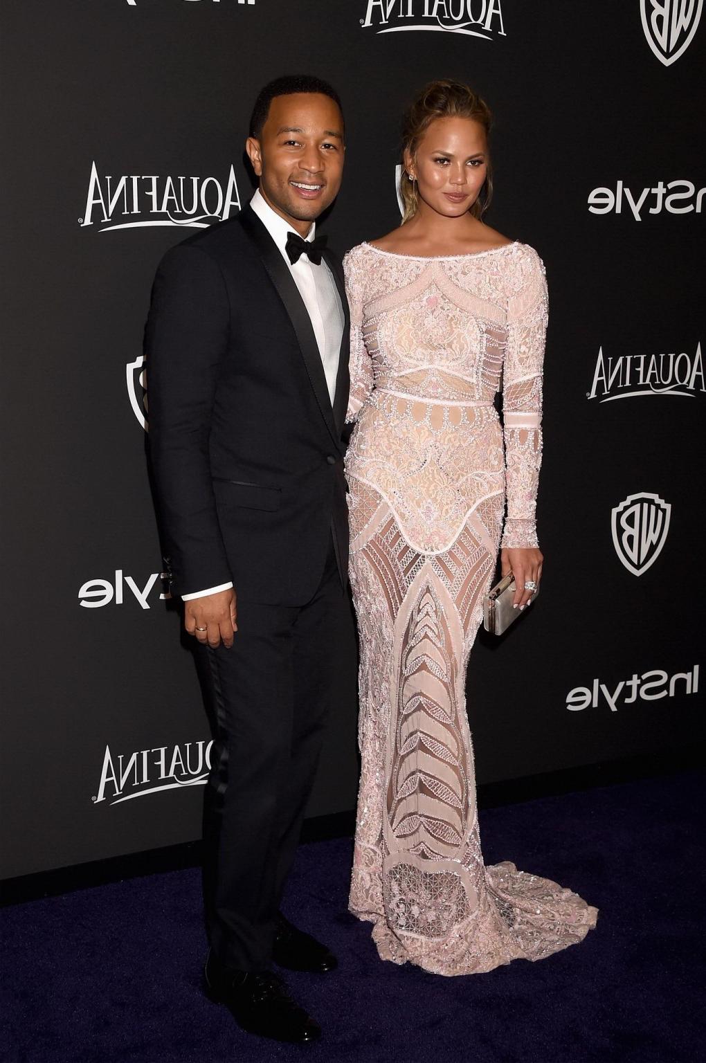 16P Chrissy Teigen shows off her big boobs wearing a see through dress at the InStyl