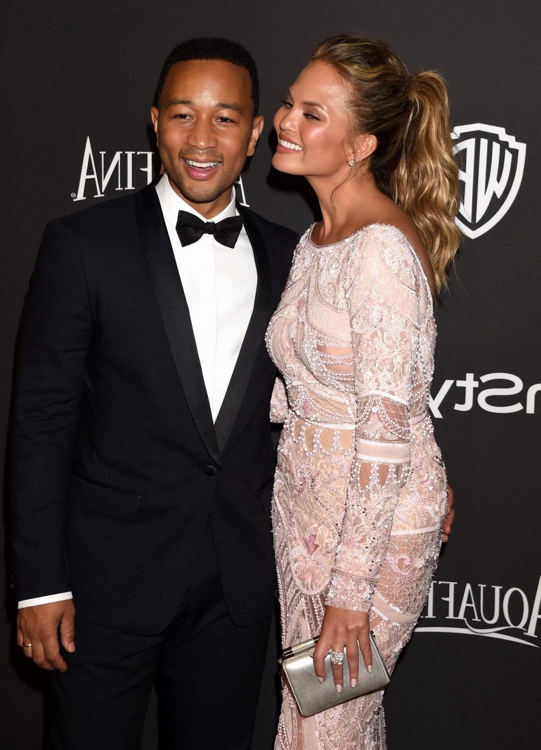 16P Chrissy Teigen shows off her big boobs wearing a see through dress at the InStyl