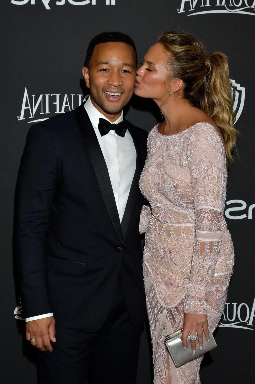 16P Chrissy Teigen shows off her big boobs wearing a see through dress at the InStyl