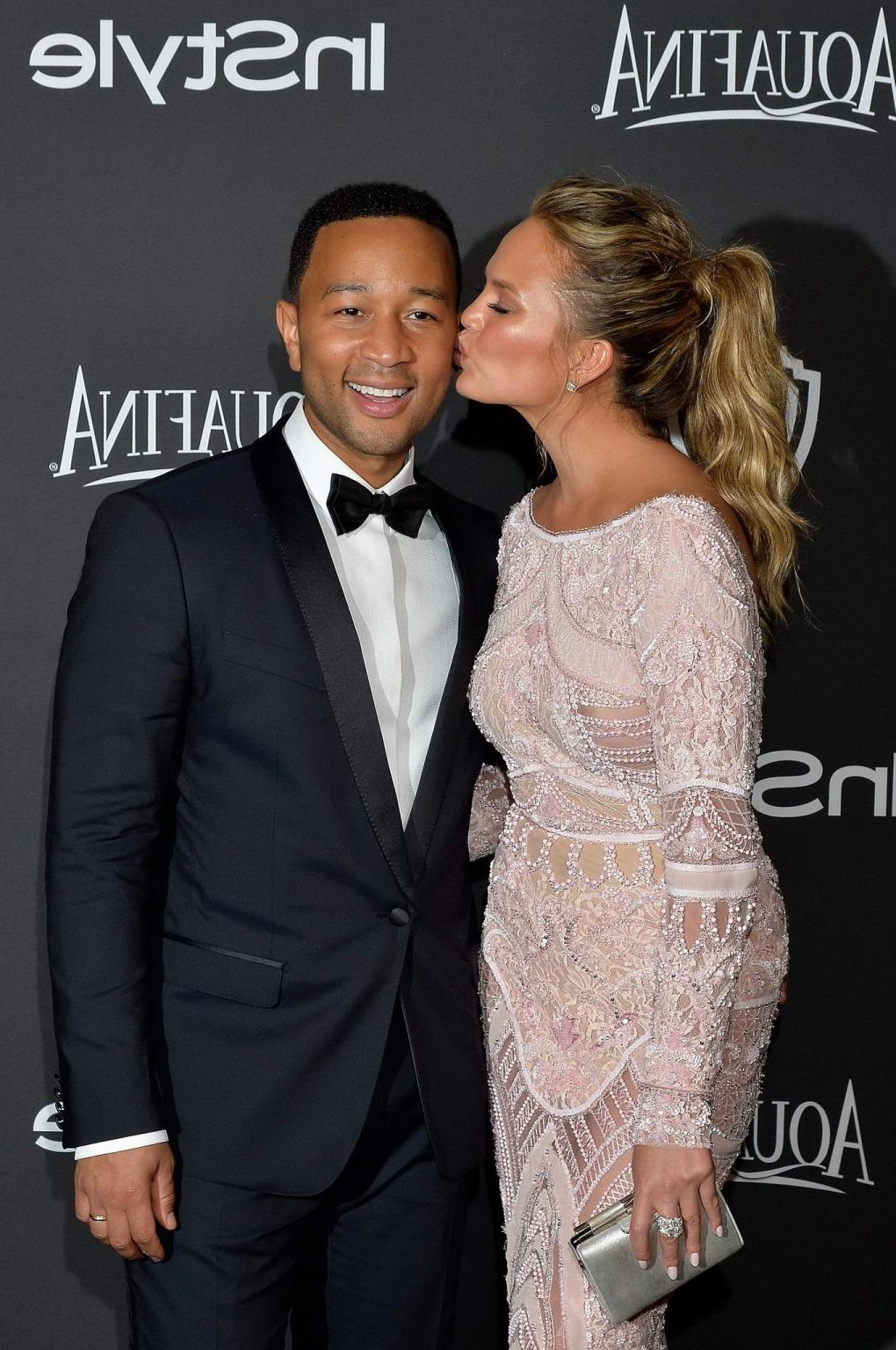 16P Chrissy Teigen shows off her big boobs wearing a see through dress at the InStyl