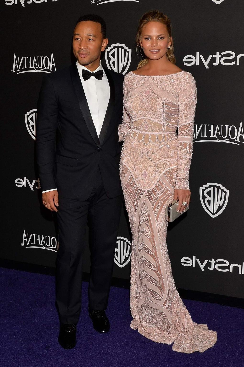 16P Chrissy Teigen shows off her big boobs wearing a see through dress at the InStyl