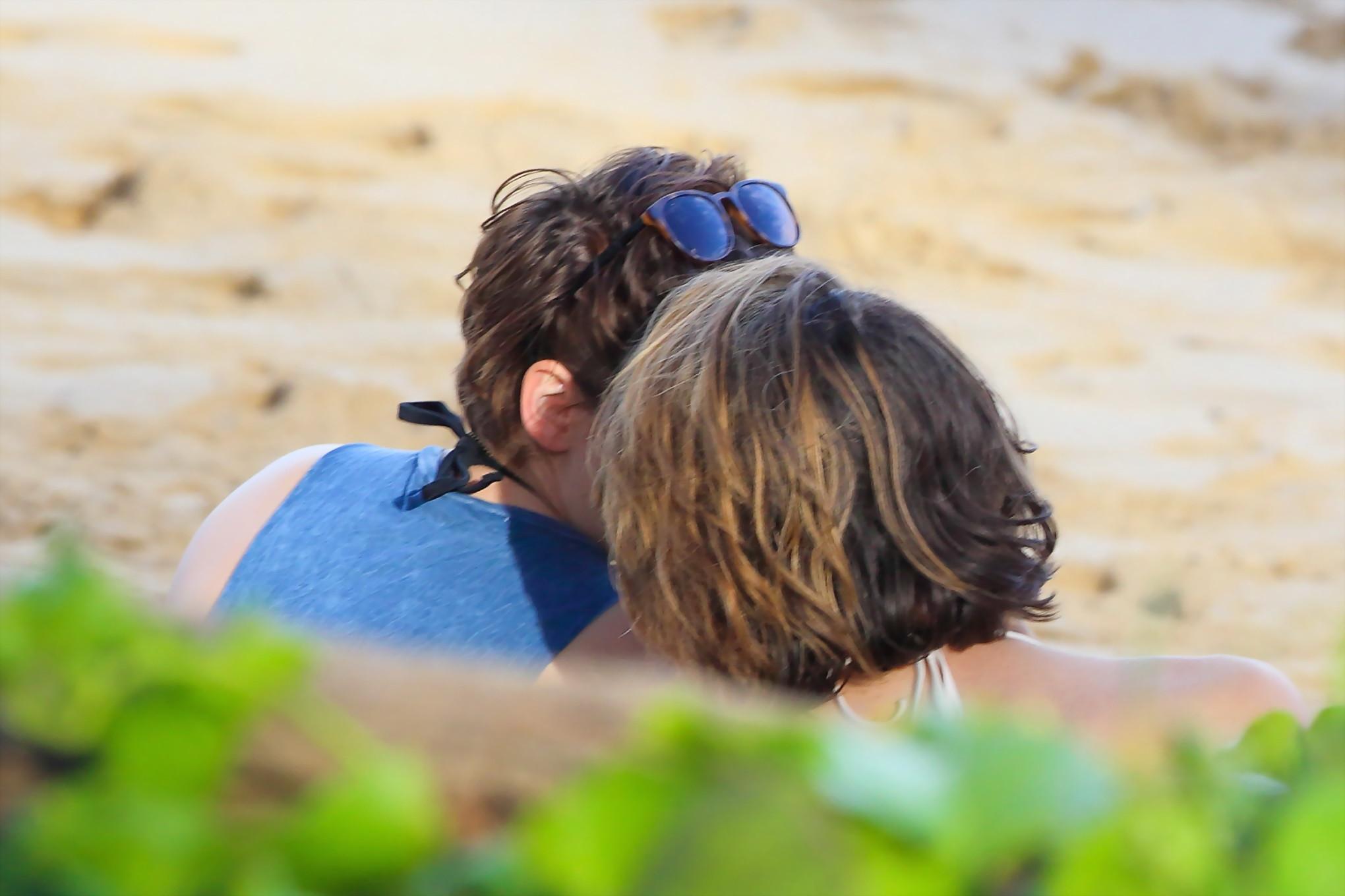 16P Kristen Stewart in bikini top and shorts kissing with some girl on the beach in 