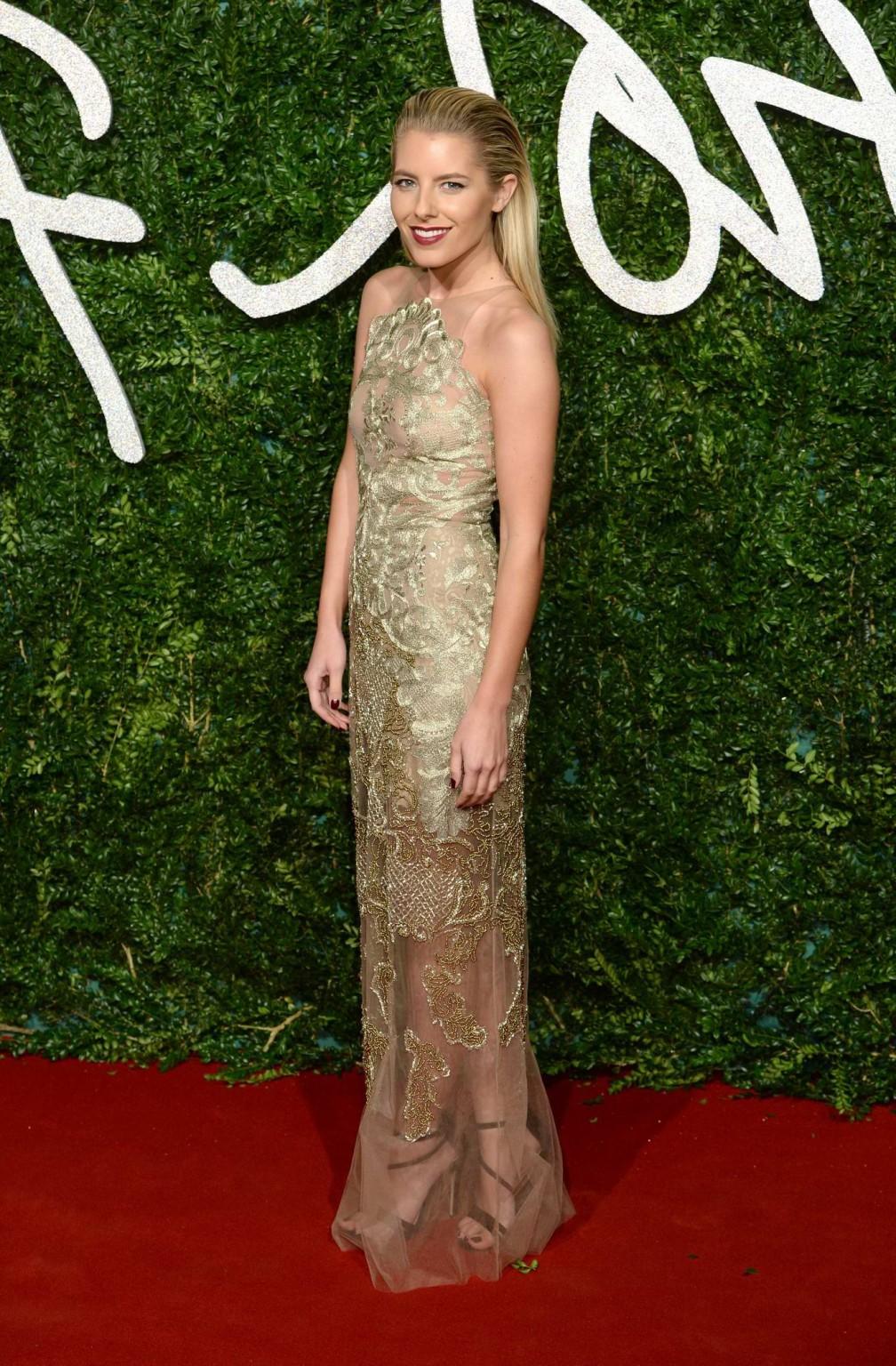 16P Mollie King braless wearing a partially see through dress at the British Fashion