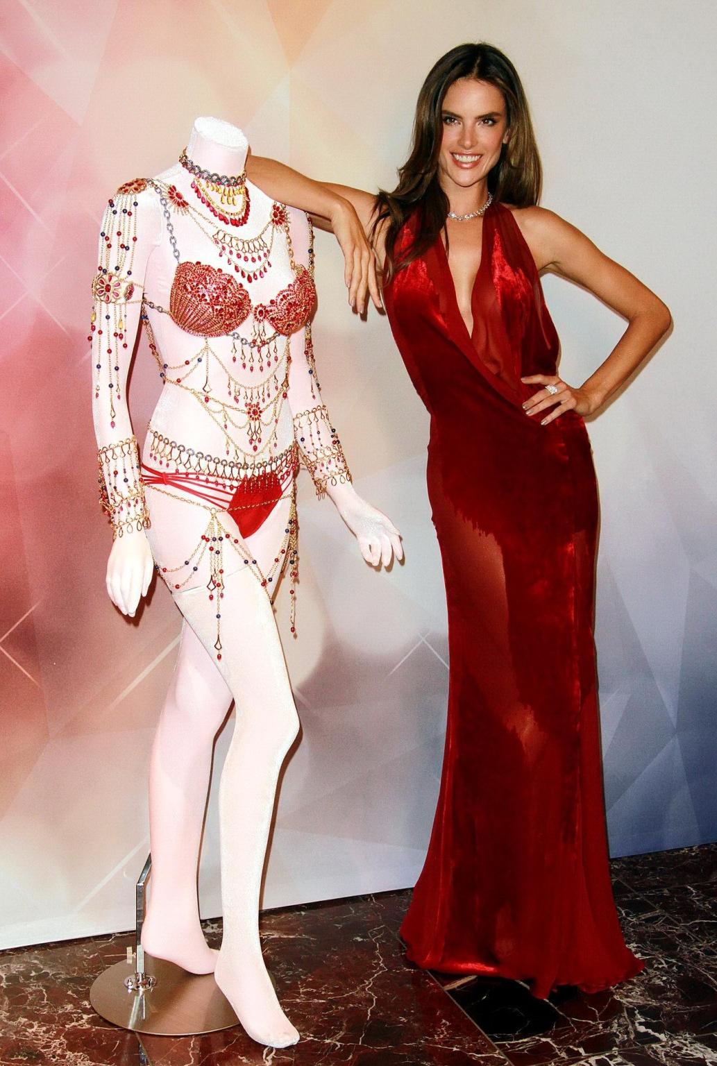 16P Alessandra Ambrosio braless and pantyless wearing a side see through red dress a