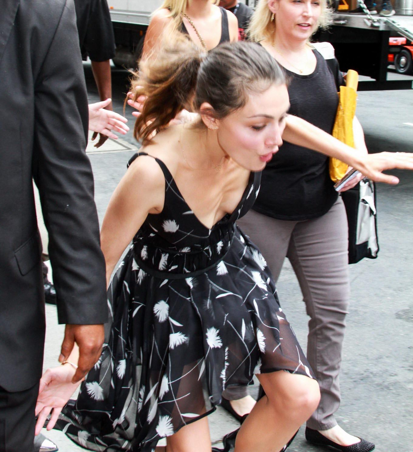 15P Phoebe Tonkin braless downblouse while loosing balance at Comic Con in San Diego