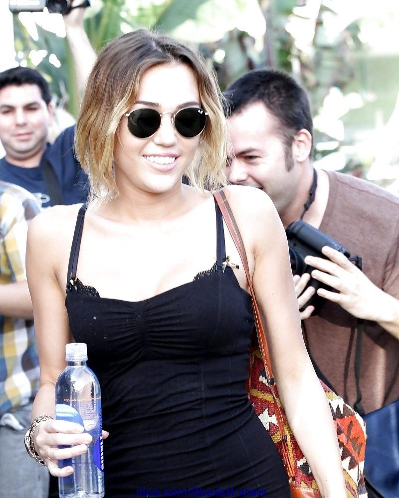 15P Miley Cyrus  see her perfect shaved pussy  upskirt pictures