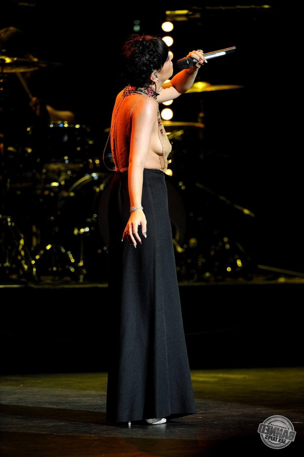 16P Lily Allen  see her nude tits through transparent top during concert