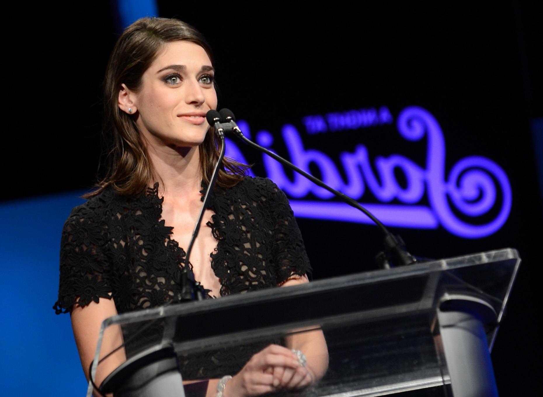 16P Lizzy Caplan wearing a see through jumpsuit at A Night at Sardis in Beverly Hill